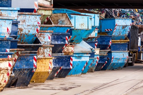 Heavy machinery involved in demolition waste removal