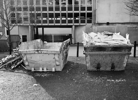 Workers handling hazardous waste materials in Limehouse